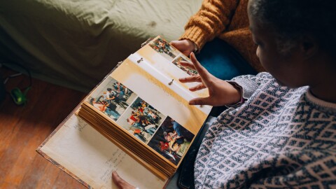 Anita Cameron (center) shares stories of ADAPT protests she participated in the late 1980s and early 1990s.