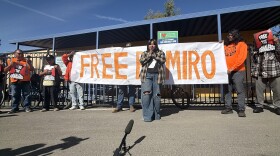 Jax Santana, center, speaks during a press conference at the Pomona Economic Opportunity Center on Monday, March 2, 2026. Santana and local officials are demanding the release of her father, Ramiro Santiago Pacheco Martinez, from ICE detention over concerns about his medical condition.