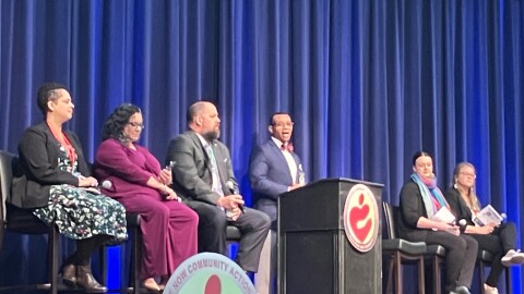 Project NOW executive director Rev. Dwight Ford (center) speaks during a panel discussion on homelessness Thursday, April 9, featuring (L-R) Christine Haley, Sangeetha Rayapati, Ron Lund, Christie Adamson and Annika O'Melia.
