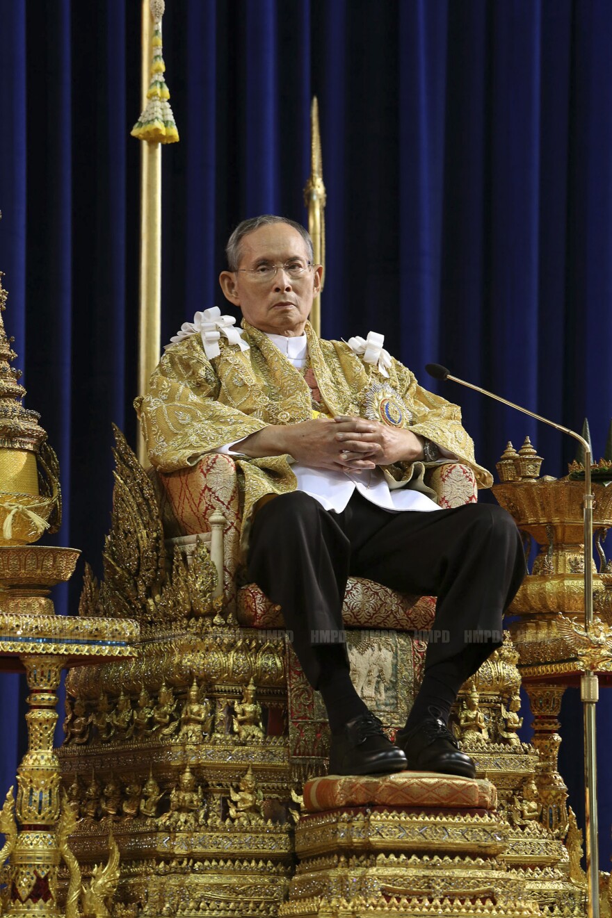 Thailand's King Bhumibol Adulyadej attends a ceremony celebrating his 86th birthday on Dec. 5. The revered king is a stabilizing force in a country that's prone to political turmoil and military coups.