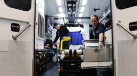 Paramedics Scott Widener (left) and Mike Warnimont (right) prepare the mobile stroke unit for the day.