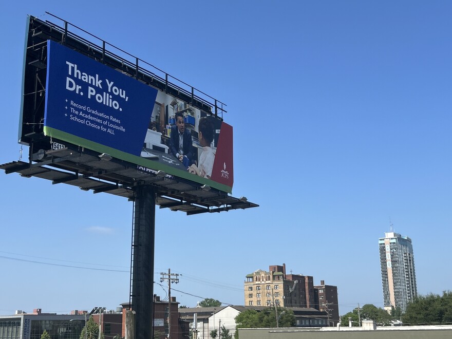 A billboard above Interstate 65 in downtown Louisville.