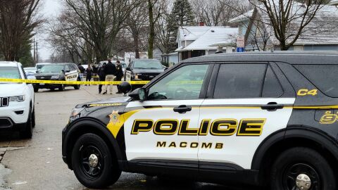Police continued to investigate the scene more than six hours after the house party shooting on March 25, 2023.
