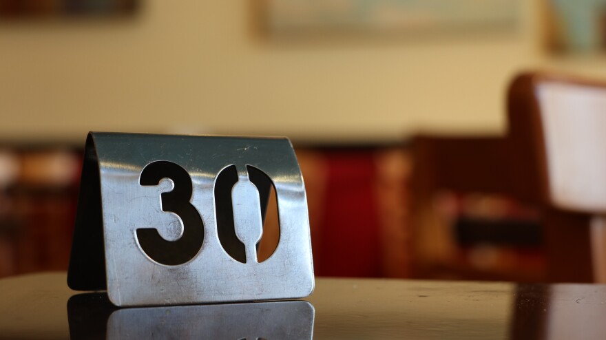 Photo of a number on a table in a restaurant