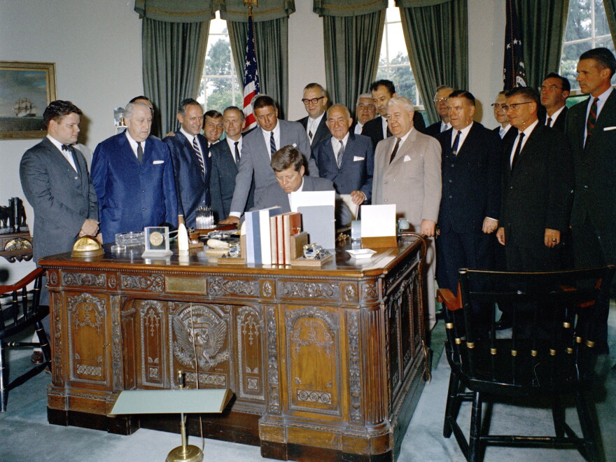 President John F. Kennedy signs S. 857, authorizing establishment of the Cape Cod National Seashore Park, Aug. 7, 1961.