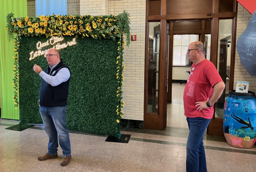 Visit Quad Cities CEO Dave Herrell, right, listens to Davenport Mayor Jason Gordon speak about the riverfront trails in the Quad Cities Wednesday, Oct. 7, 2026.
