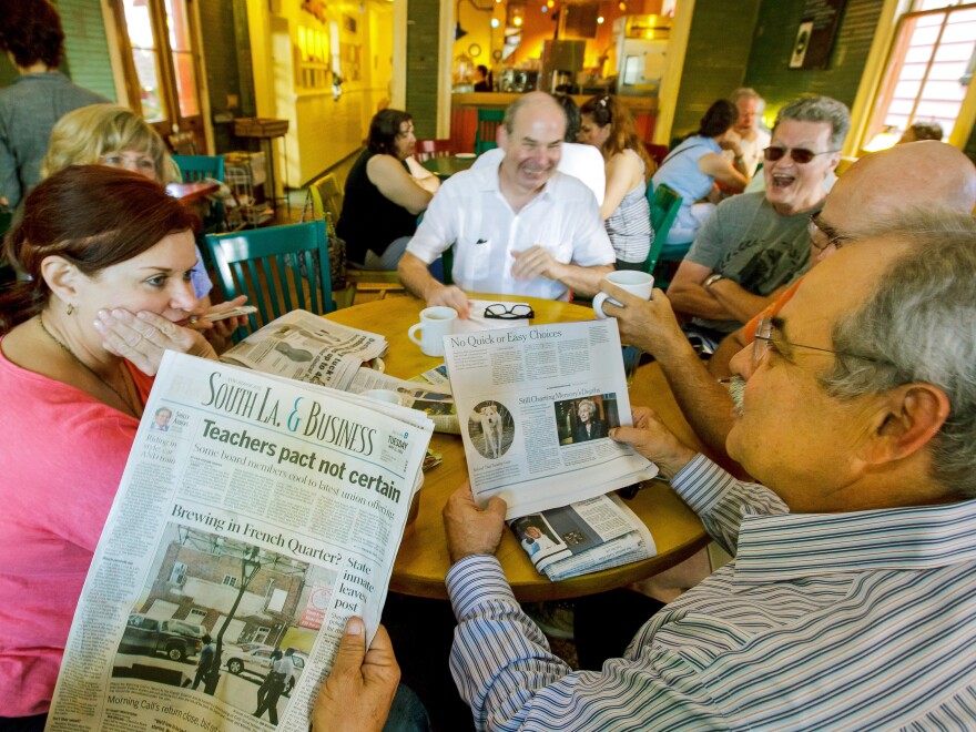 A year later, these friends are still gathering to talk over the paper, but it's not <em>The Times-Picayune.</em> From left: Sue Paraski, Sharon Morrow, Eric Hartman, Joe Mole.