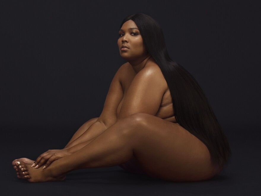 "That was me just so comfortable not trying to cover anything up," Lizzo says of the cover photo for <em>Cuz I Love You.</em>