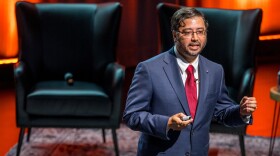 Ashique KhudaBukhsh, assistant professor in the Department of Software Engineering and affiliate of the ESL Global Cybersecurity Institute, speaks during an inauguration event, RIT in Coversation, on Friday, Sept. 26, 2025, at Sklarsky Glass Box Theater in the SHED Student Hall for Exploration and Development.