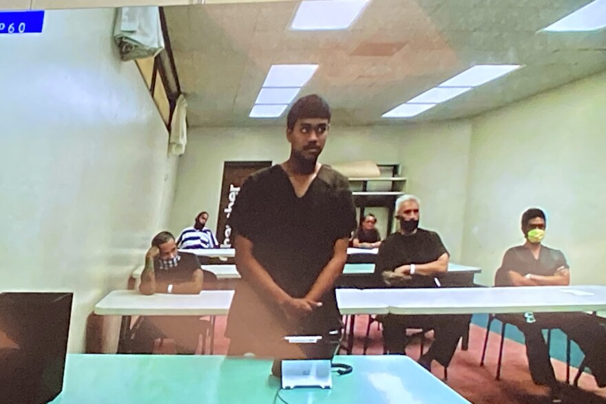 Jacob Borge appears in court for an arraignment via video in Honolulu, Thursday, April 27, 2023. Borge pleaded not guilty to murder and other charges stemming from a shooting at a Hawaiʻi cockfight. (AP Photo/Jennifer Sinco Kelleher)