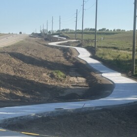 A new portion of recreation trail in Dickinson County is shown on the south edge of Milford, Iowa, adjacent to U.S. Highway 71 on September 7, 2025. (Bret Hayworth, Siouxland Public Media News)