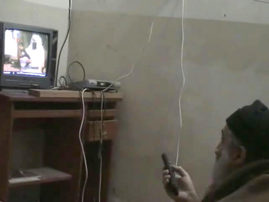 A still image from video footage released by the U.S. Department of Defense shows Osama bin Laden watching himself on TV.