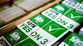 Signage encouraging the passing of Amendment 3, which would legalize recreational marijuana, on Saturday, Nov. 5, 2022, at the Board of Aldermen presidential-hopeful Megan Green’s campaign headquarters in the Central West End.