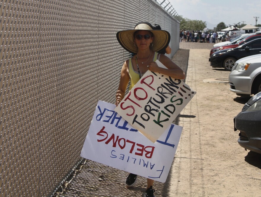 Yvonne Nieves protests the treatment of children in Border Patrol custody in Clint, Texas, July 1, 2019. Photo by Cedar Attansio, The Associated Press