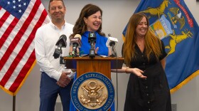 Kristen McDonald-Rivet (D-Bay Citys is joined by Chelsea Fitzgerald of Saginaw and Justin Pommerville with UA Local 85, as she holds a press conference for a recently introduced anti-corruption bill in Saginaw, Michigan, on Friday, July 10, 2026.