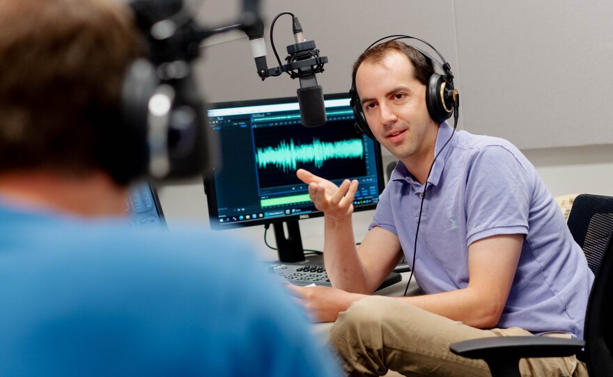 Jason Rosenbaum speaks with a man in studio