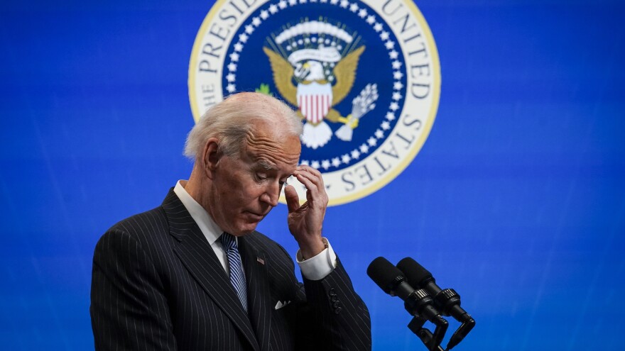 President Biden pauses while speaking after signing an executive order related to manufacturing, at the White House on Monday. Biden is off to a fast start but is running into resistance in Congress.