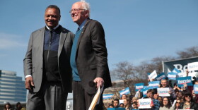 Sen. Bernie Sanders and Rev. Jesse Jackson greet the crowd during a campaign rally in Grand Rapids, Michigan. (Scott Olson/Getty Images)