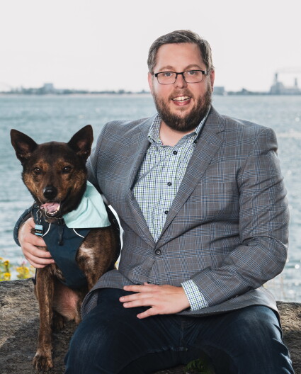 Brandon VanWaeyenberghe and his dog Barley.