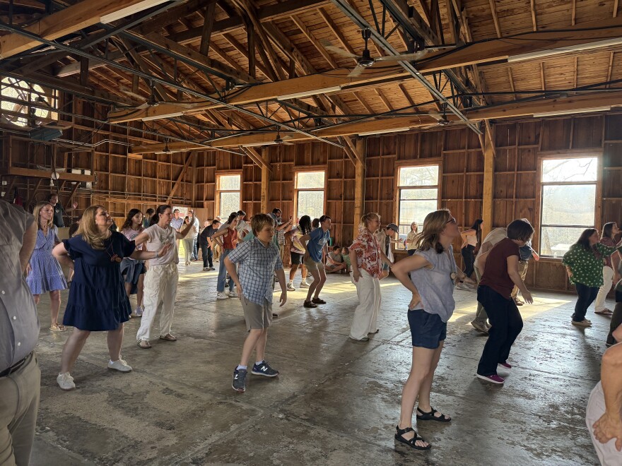 People danced in a nearby auditorium
