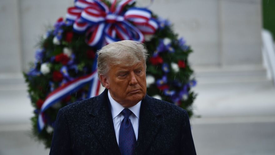 President Trump attends a Veterans Day wreath-laying ceremony at Arlington National Cemetery, in his first official appearance since Election Day.