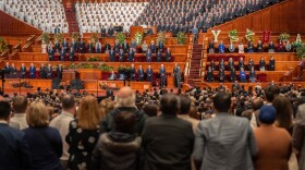 Russell M. Nelson’s funeral at The Church of Jesus Christ of Latter-day Saints Conference Center in Salt Lake City, Oct. 7, 2025. Church leaders and attendees stood while they waited for Dallin H. Oaks, who conducted the funeral, to enter.