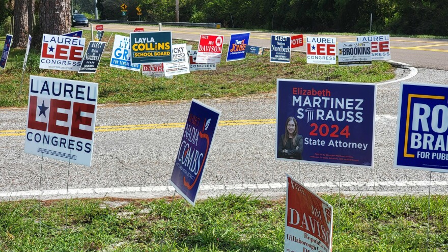 Voting signs along a road