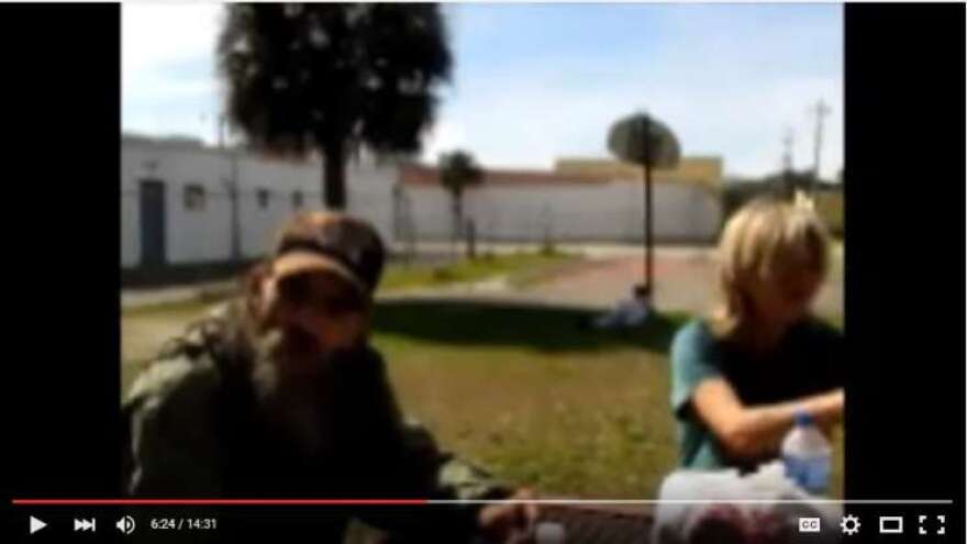 A screenshot taken of a Youtube video in which a Daytona Beach couple speaks with the area's homeless who allege Mike Pastore is pocketing cash donations for a shelter. Photo: Youtube.