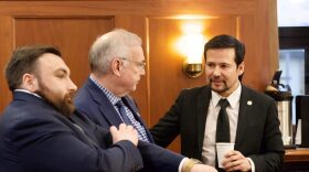 Reps. CJ McCormick, D-Bethel, left, Bryce Edgmon, I-Dillingham, center, and Neal Foster, D-Nome, speak during a House floor session on Feb. 19, 2024.