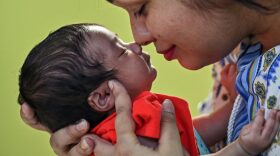 This photograph taken on April 24, 2023 shows writer and journalist Shreyosi along with her daughter Aarya at their home in Bengaluru. - Shreyosi, 30, had been married for five years and like most things in her life, her pregnancy was "unplanned". India has become the world's most populous nation, and for the country's new mothers it is a moment of great hope but also anxiety as they face an uncertain future. (Photo by Manjunath KIRAN / AFP) / To go with 'India-China-Population-Women-Mothers', FOCUS (Photo by MANJUNATH KIRAN/AFP via Getty Images)