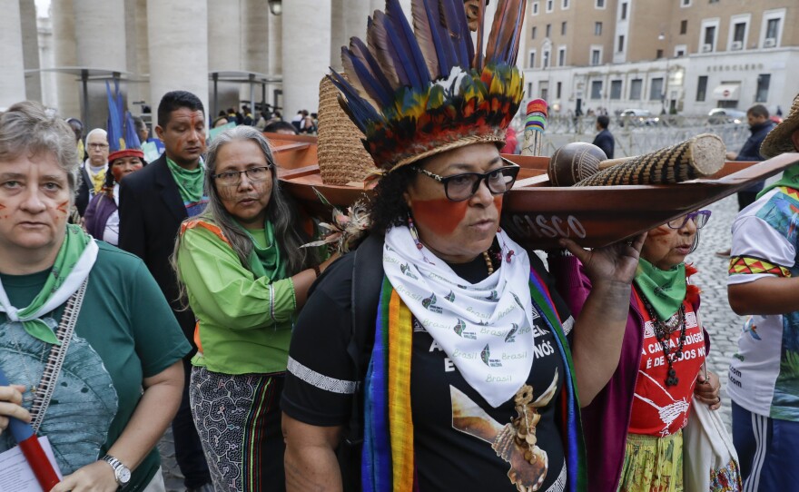 Participants in the Amazon synod arrive in St. Peter's Square, at the Vatican, on Monday.