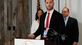 Republican assembly member David Tangipa, center, speaks to reporters during a press conference announcing a federal lawsuit challenging Proposition 50, Wednesday, Nov. 5, 2025, in Sacramento, Calif.