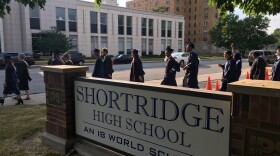Shortridge High School graduates walk outside the school in 2018.