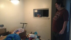 Photo of a woman standing in a room