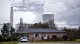 FILE: The stacks from the Gavin coal burning power plant dwarf a small nearby home on February 4, 2012 in Cheshire, Ohio.