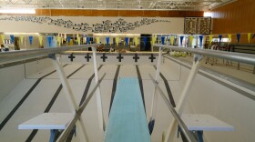 The pool has ramp access near the front but gets as deep as 12 feet near the diving board.
