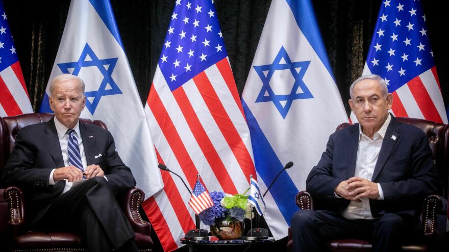 President Biden sits with Israeli Prime Minister Benjamin Netanyahu, at the start of the Israeli war cabinet meeting, in Tel Aviv on Oct. 18, 2023.