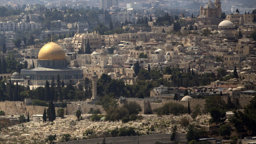 The Dome of the Rock Mosque in the Al-Aqsa Mosque compound, known by the Jews as the Temple Mount, is seen in Jerusalem's Old City. Israel closed the site to all visitors on Thursday following an assassination attempt on a right-wing Jewish activist.