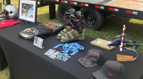 A table display's the things that shaped Ryan Cutter's life at a celebration of life Oct. 24, 2026, at the Utah Olympic Park.