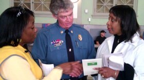 Earlene Magee (L) and Sharon Powell-Miller(R) were among dozens engaging with KCPD Major Ron Fletcher.