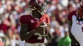 Alabama quarterback Jalen Milroe (4) looks for a passing outlet against Arkansas during the first half of an NCAA college football game, Saturday, Oct. 14, 2023, in Tuscaloosa, Ala. (AP Photo/Vasha Hunt)