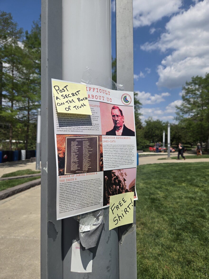 A poster advertising a student volunteer event on UC's quad gives information about the UC radiation experiments and other controversial parts of UC's past.