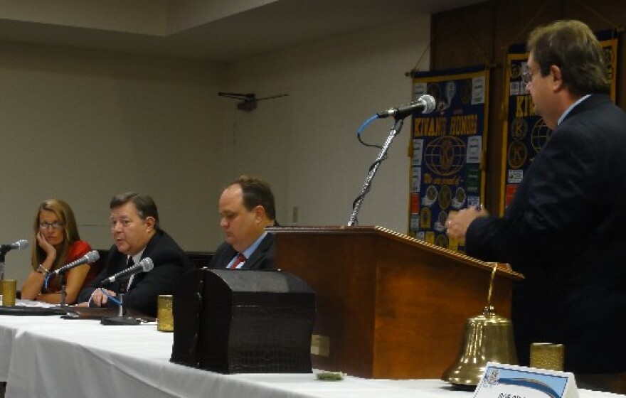 Karen Gilbert, Sam Roop, and Chris Trail answer questions from KWGS' John Durkee at the Kiwanis Club of Tulsa.