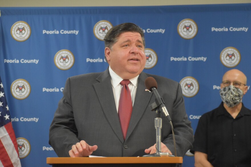 Gov. JB Pritzker speaks Thursday, July 30, 2020 at the Peoria City/County Health Department.