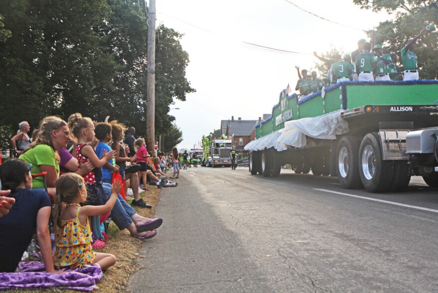 Uganda's team rolls through Williamsport, Pa., during the kickoff parade for the Little League Baseball World Series.