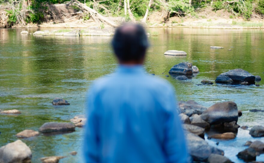 Detlef Knappe, a professor and scientist at N.C. State University who studies PFAS, stands for a portrait at the Haw River in Bynum, N.C. on April 29, 2026.