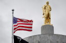 An American flag waves at the Oregon State Capitol on June 27, 2026.