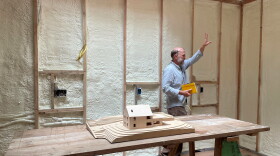 Adam Hopfner of the Yale School of Architecture tours a two-family home on Howard Street in New Haven. The home will house teachers at the Friends Center for Children and their families.