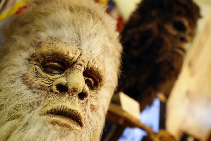 Bigfoot masks on display at a museum