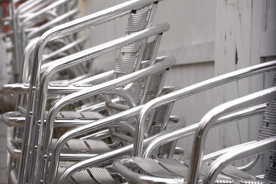 A photo of stacked chairs at the former Standard Grain restaurant.